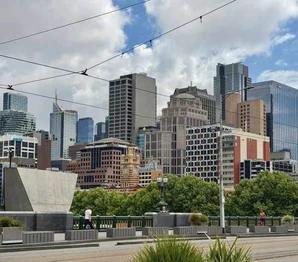 The city skyline from Princes Bridge, with the Flinders Street Station clock tower among the buildings